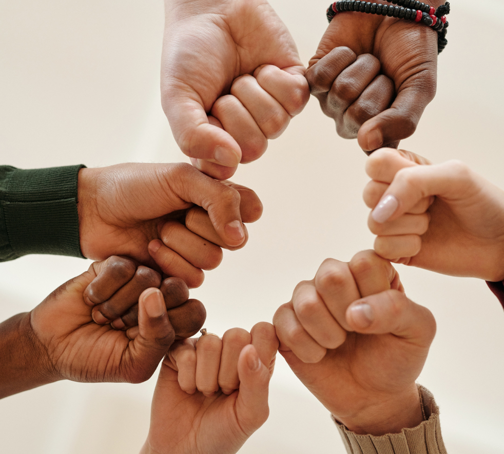 group of hands symbolising strength